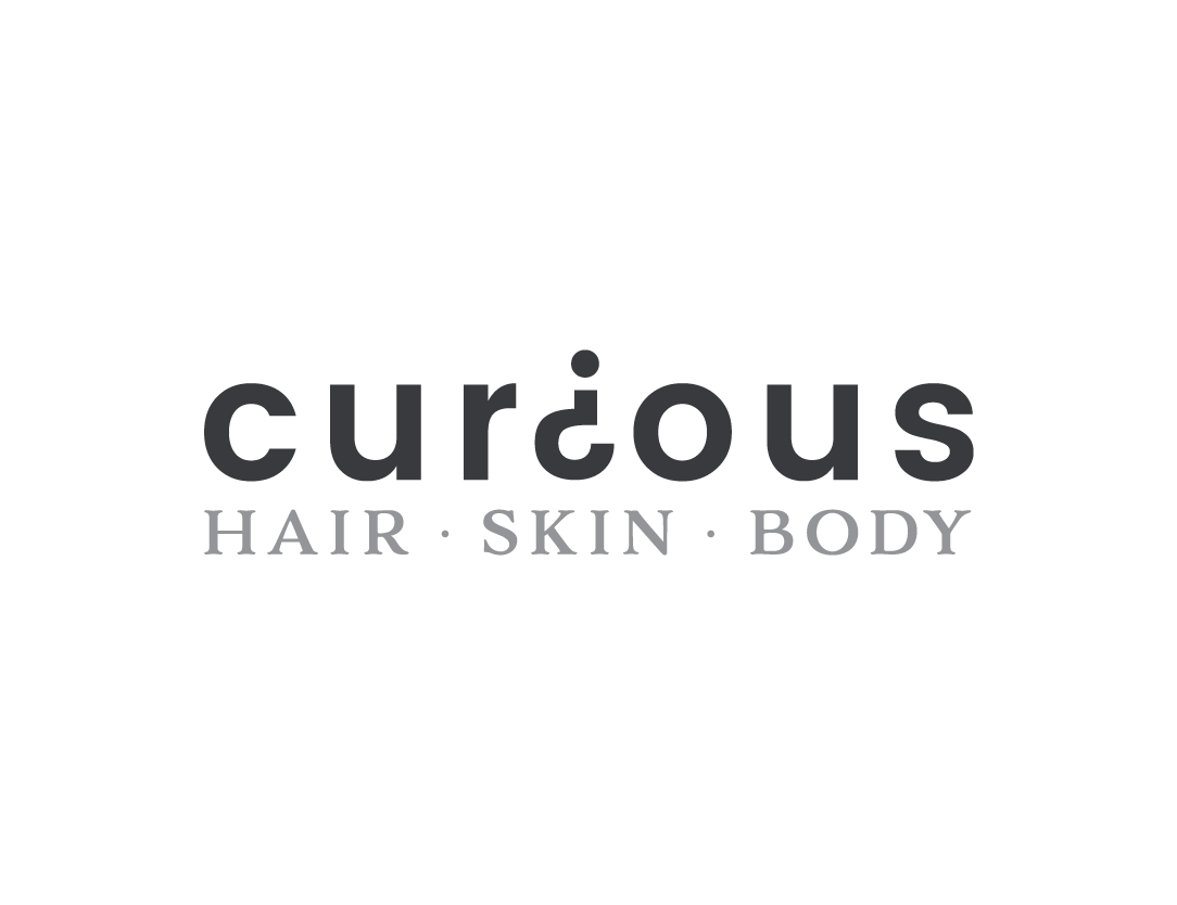 The Curious Hair Salon logo.